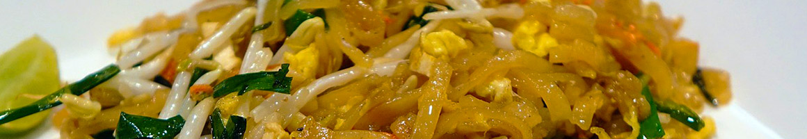 Eating Thai Vietnamese at OBAO Midtown restaurant in New York, NY.